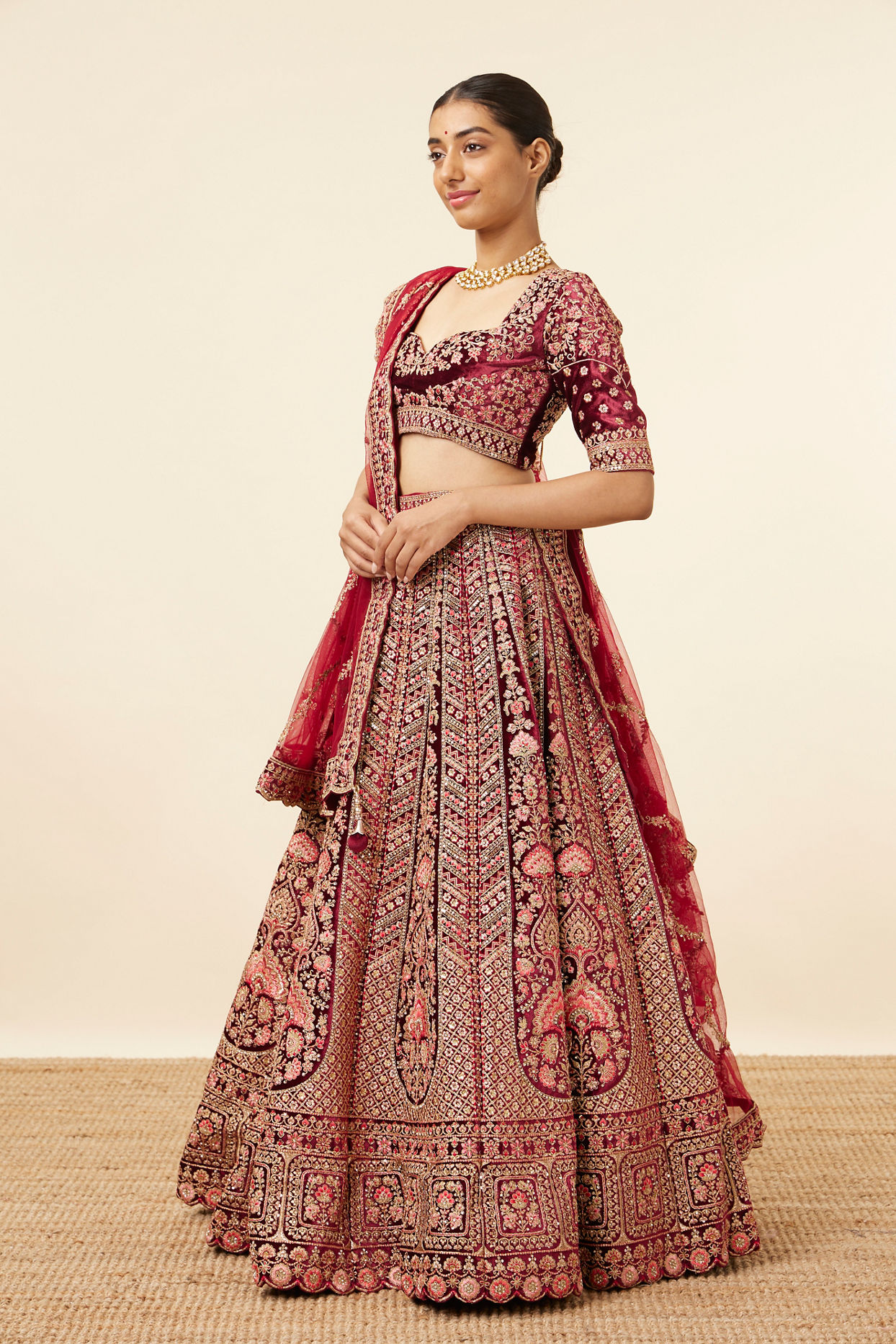 alt message - Mohey Women Maroon Embellished Bridal Lehenga image number 2